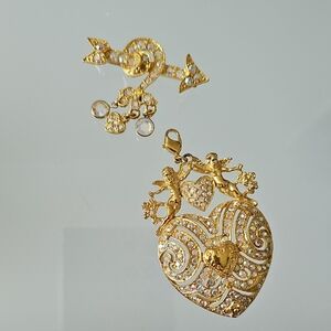 KIRKS FOLLY ANGEL AND HEART ARROW COMBO BROOCH.